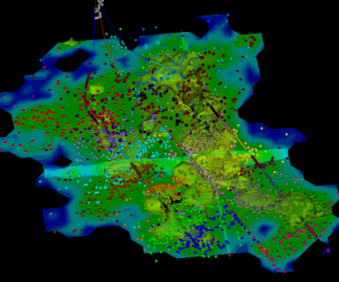 Example microseismic mapping for a dual-well horizontal hydraulic fracture project in the Marcellus shale.  Events are coloured by stage and the stimulated reservoir volume (SRV) is displayed by the coloured blue/green surface.